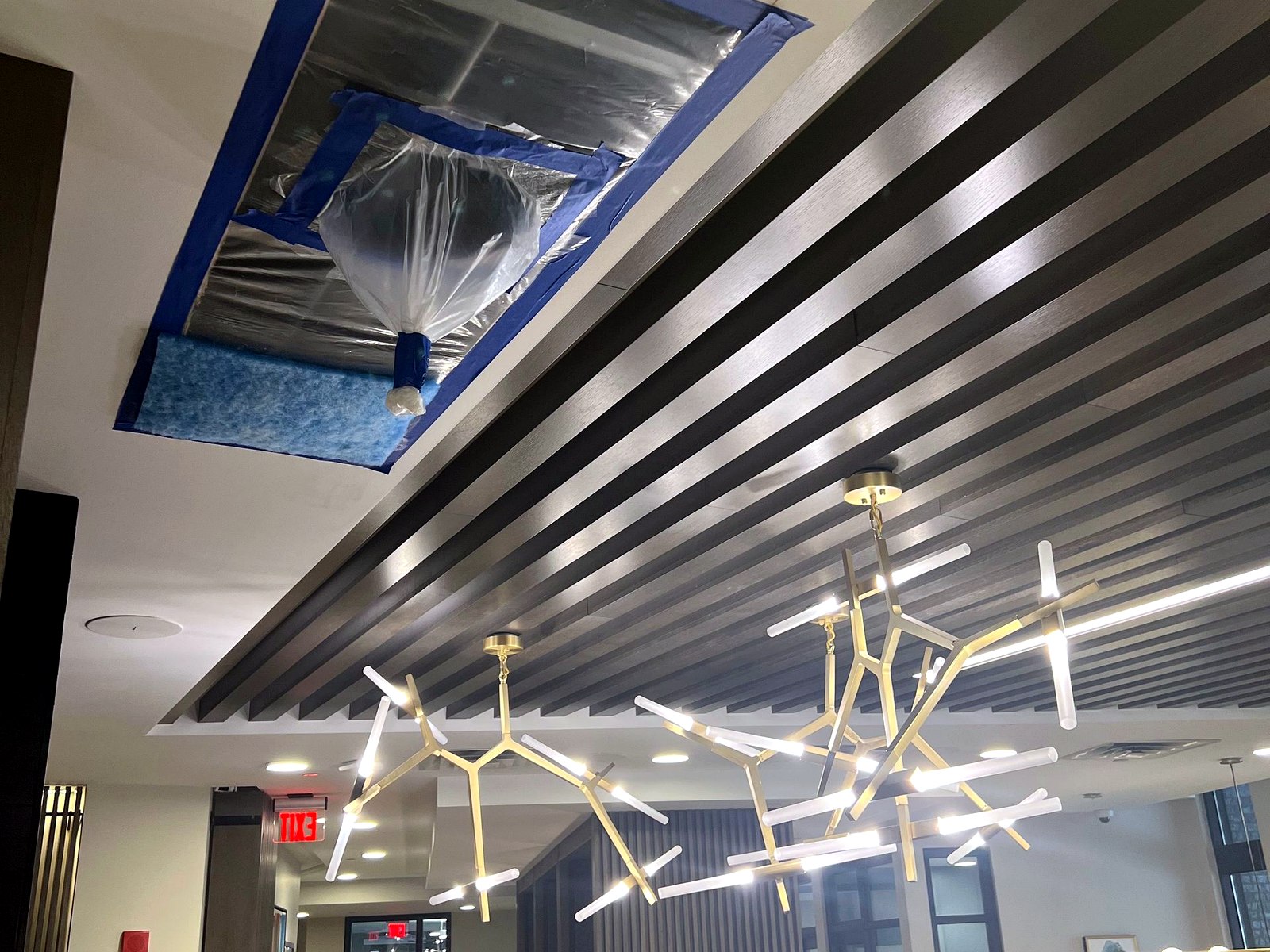 Ceiling restoration in a commercial lobby